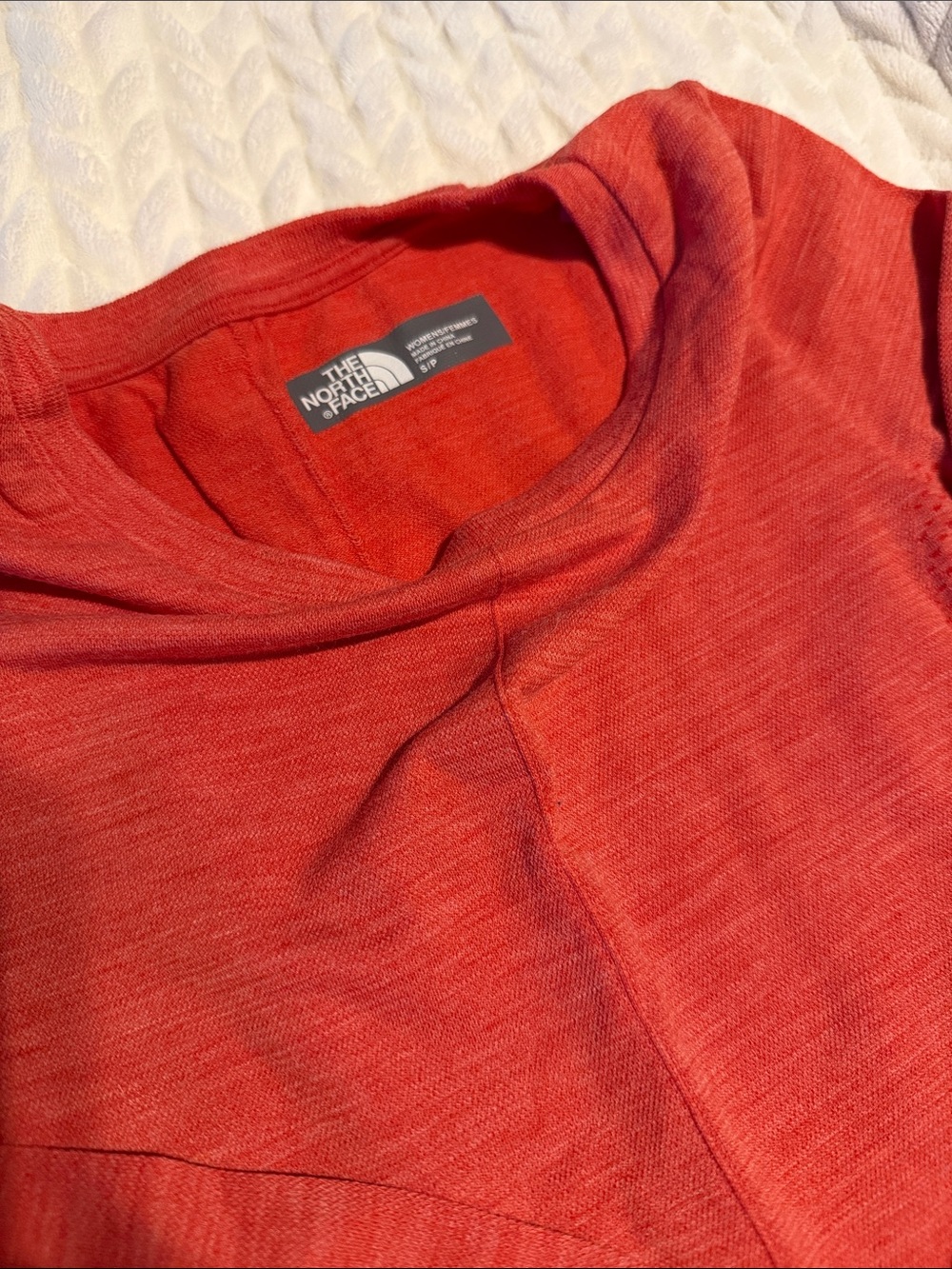 The North Face women’s Coral-Red Crewneck baselayer